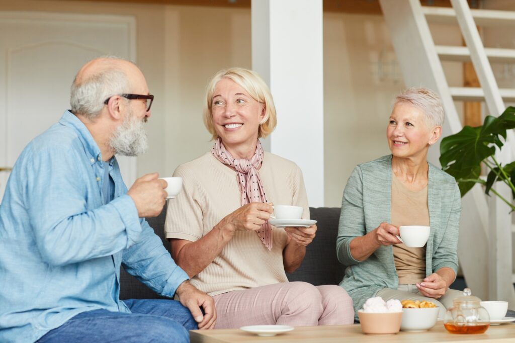 Happy people drinking tea